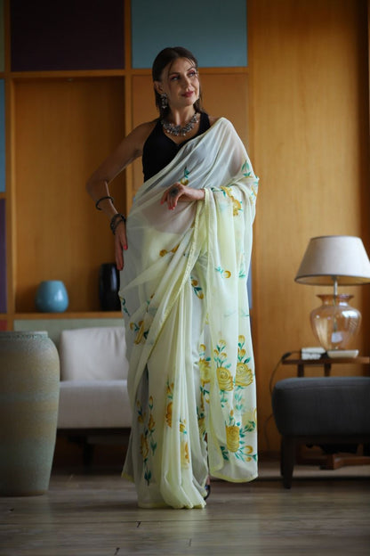 YELLOW STUNNING GEORGETTE SILK SAREE WITH HANDPRINT, GOLD ZARI & CHIKANKARI BORDER