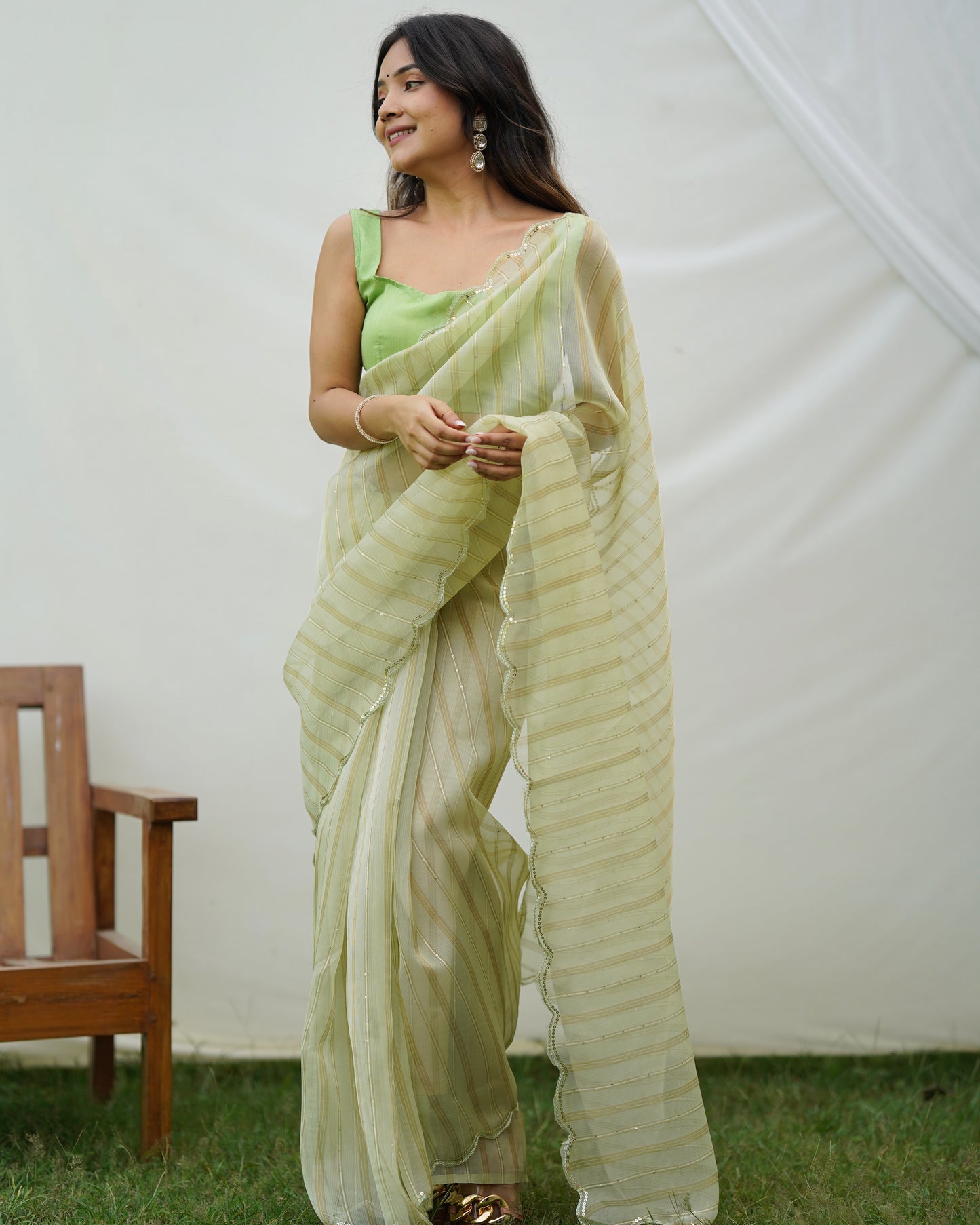 PISTA ELEGANT SEQUINS SAREE WITH GOLDEN WEAVING LINES & ARCO CUTWORK BORDER