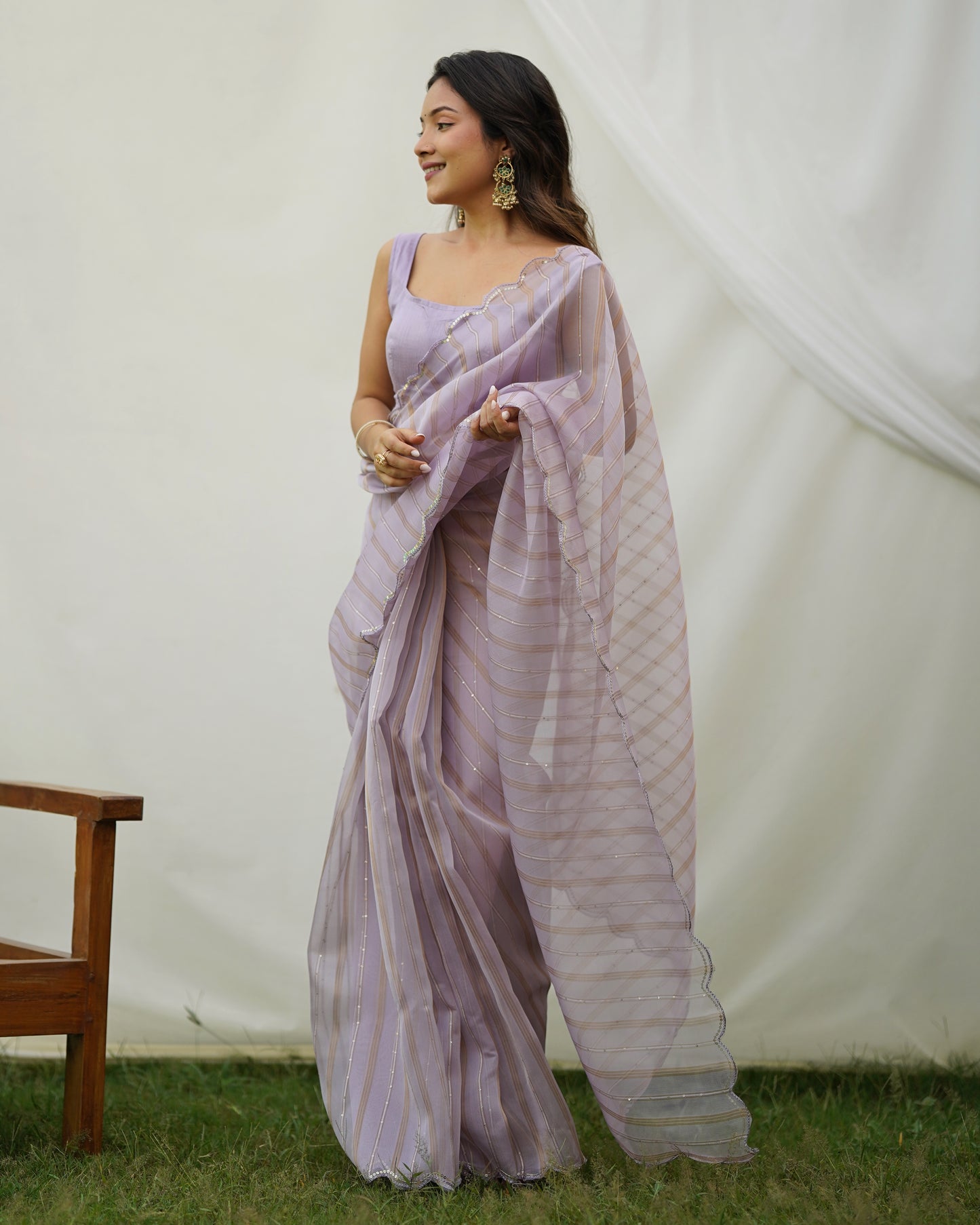 LAVENDER ELEGANT SEQUINS SAREE WITH GOLDEN WEAVING LINES & ARCO CUTWORK BORDER