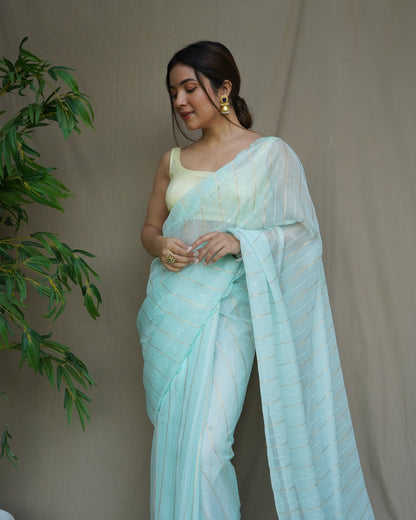 SEA GREEN FOIL PRINT DIGITAL SAREE WITH HAND CUTWORK BORDER & SATIN BANGLORI BLOUSE