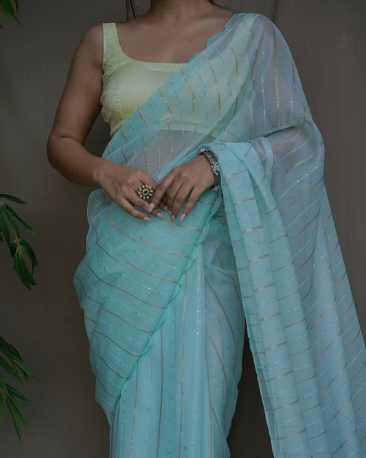 SEA GREEN FOIL PRINT DIGITAL SAREE WITH HAND CUTWORK BORDER & SATIN BANGLORI BLOUSE