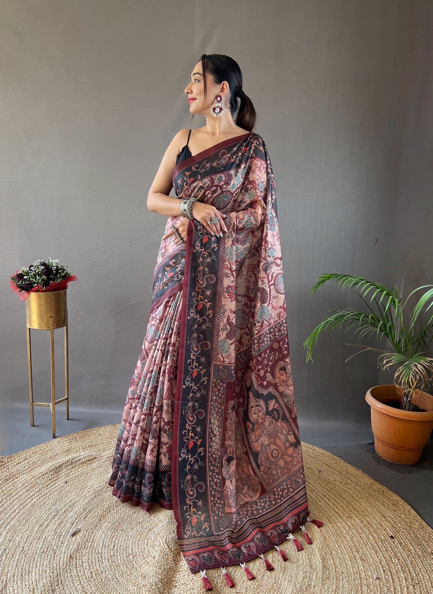 Peach Beautiful pallu and border all over the saree with tassels