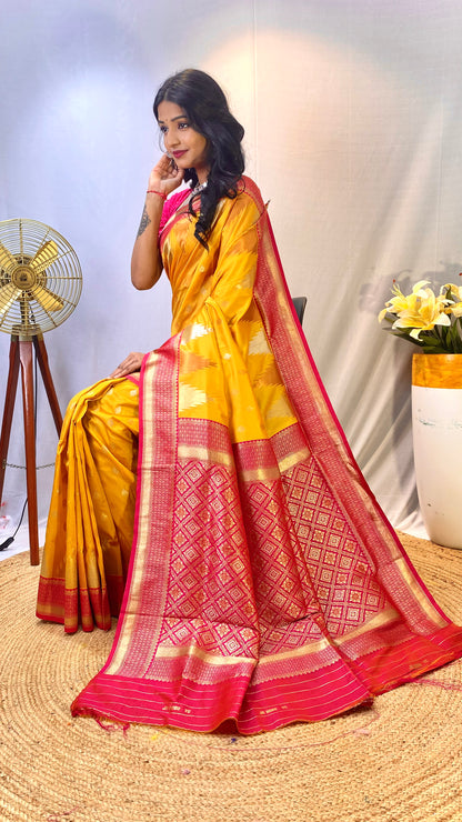 Yellow Kanchipuram sarees with a temple weaving border.